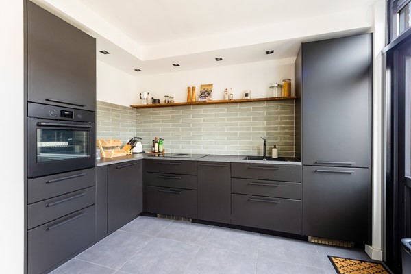 Foto - Te koop: Instapklare tussenwoning in Breda